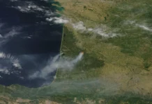 France Wildfires Force New Evacuations Amid Heatwave Thick smoke rising from forest wildfires near the French Atlantic coast during a severe heatwave
